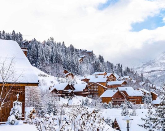 Snowy chalets in Méribel