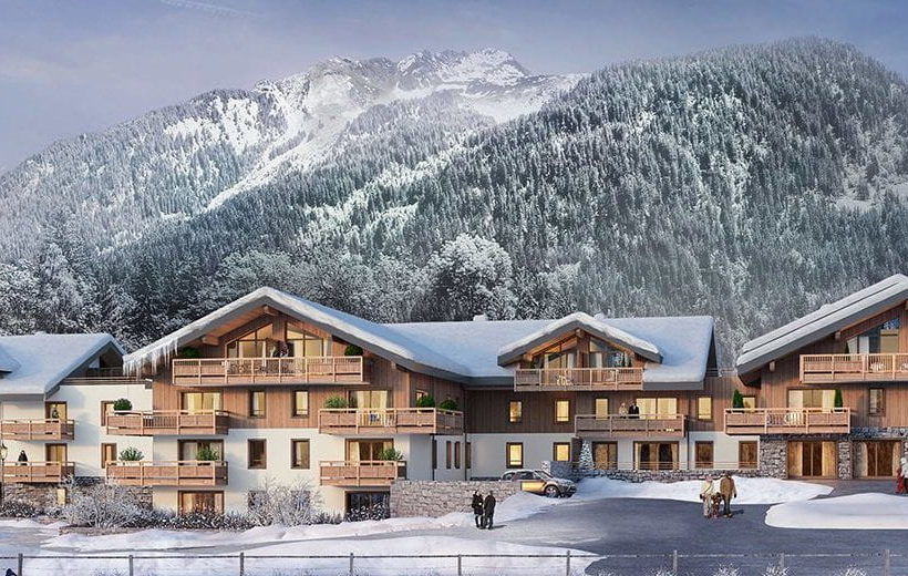 Chalets enneigés avec vue sur la montagne